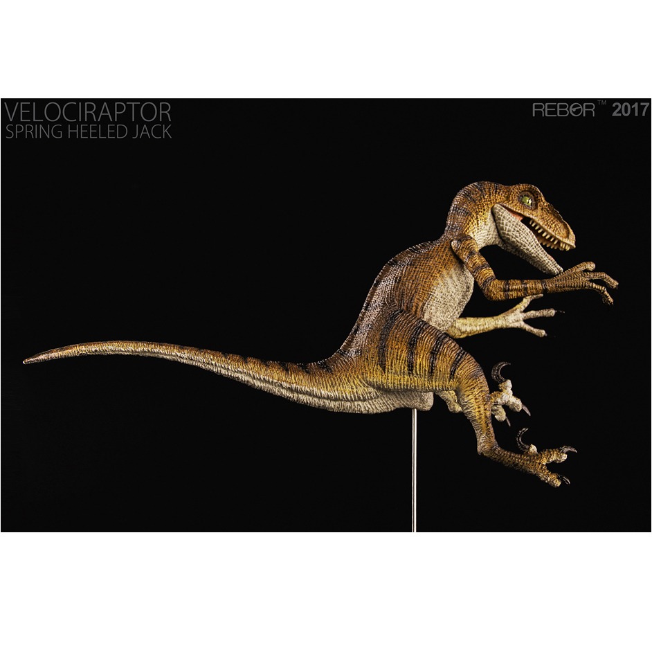 jumping velociraptor toy